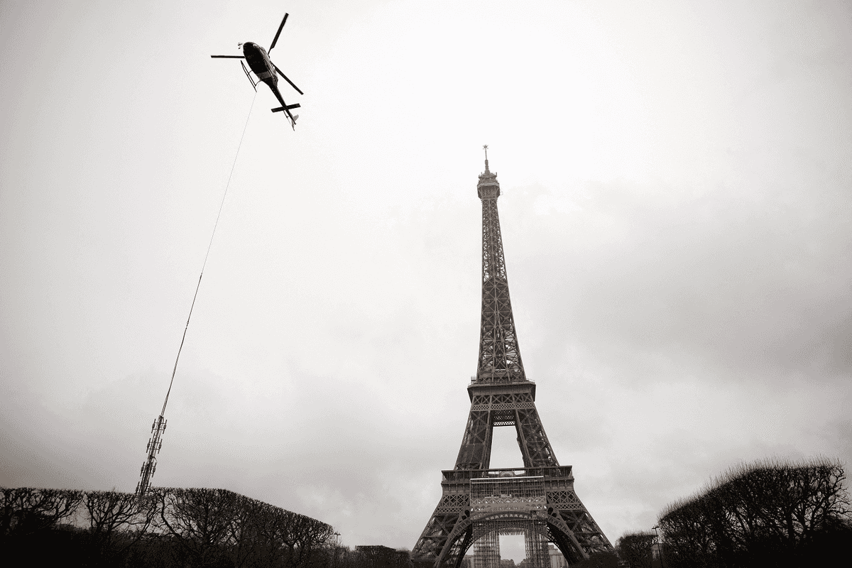 Eiffel Tower reopens after row over removing women staff