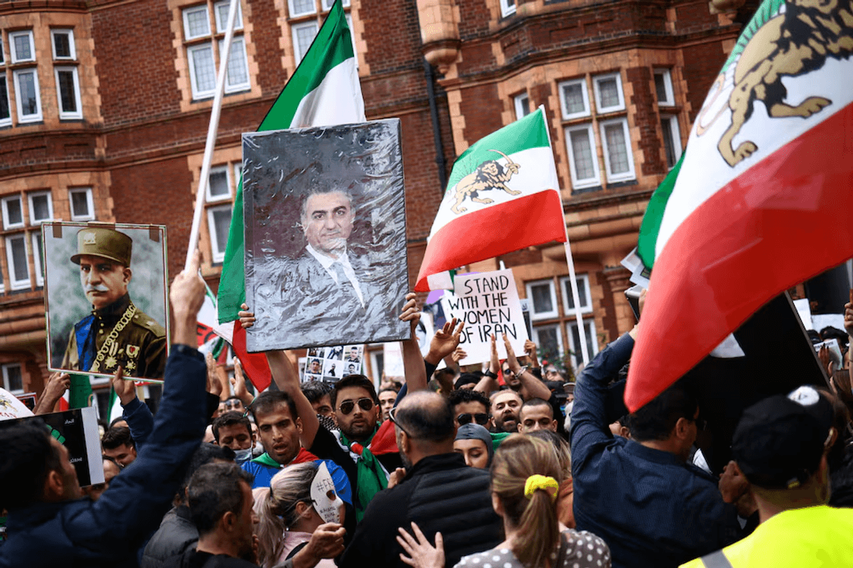 Iran's divided opposition senses its moment but activists remain wary of protests