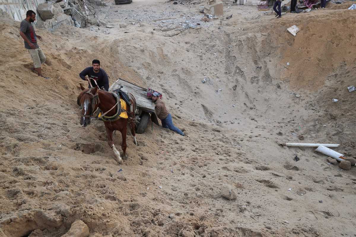 Gaza civil defense says Israeli forces kill 37, including children