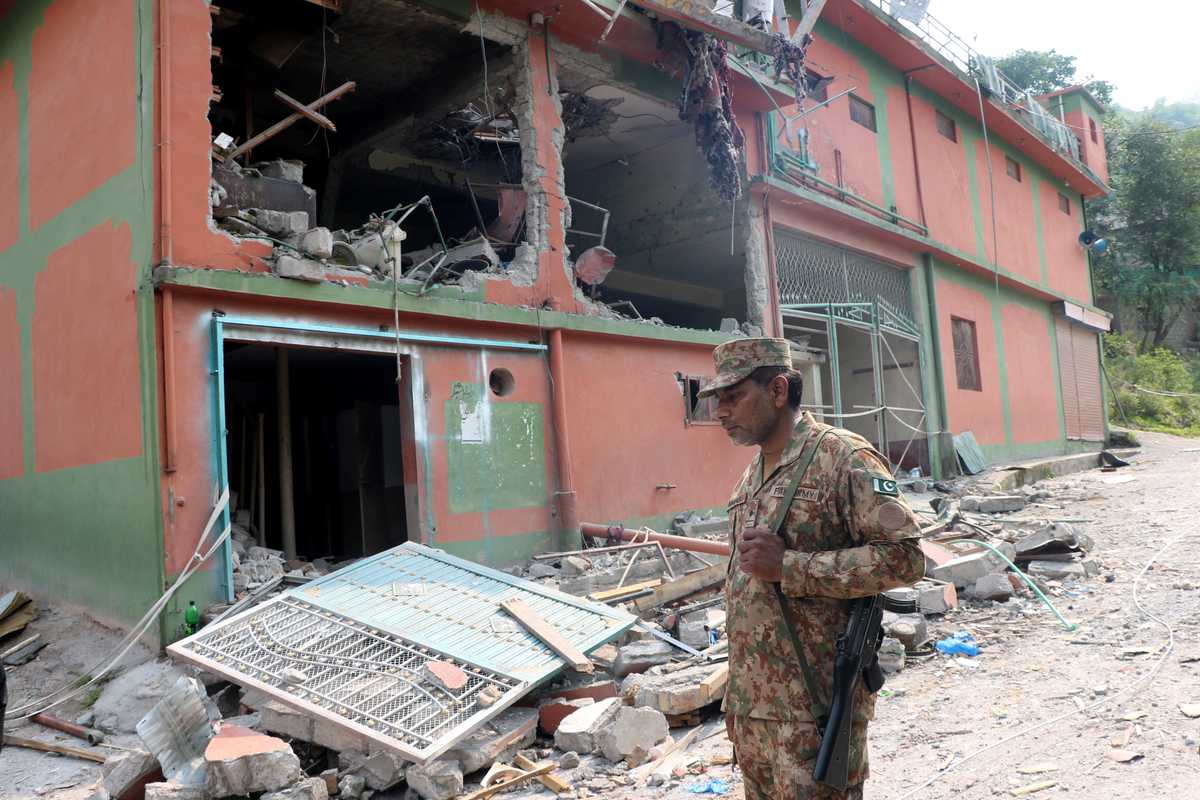 Pakistanis survey destruction after India strikes, warn they 'are not weak'