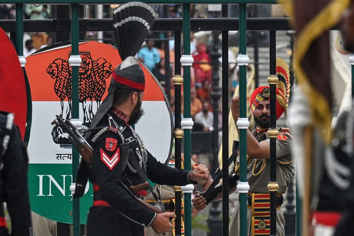 India Pakistan tensions ease as troop withdrawal, border ceremony resumption announced