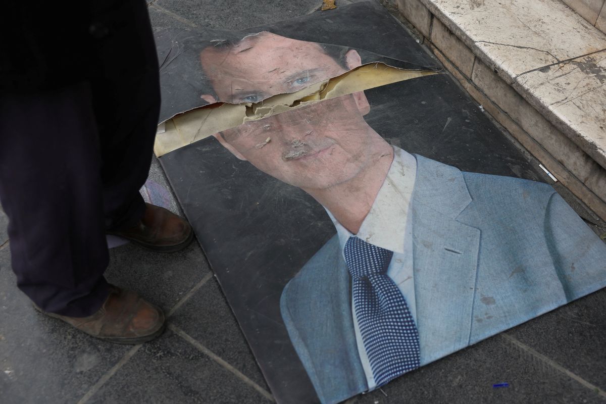 Assad denies 'planned' exit from Syria, calls new leaders 'terrorists'