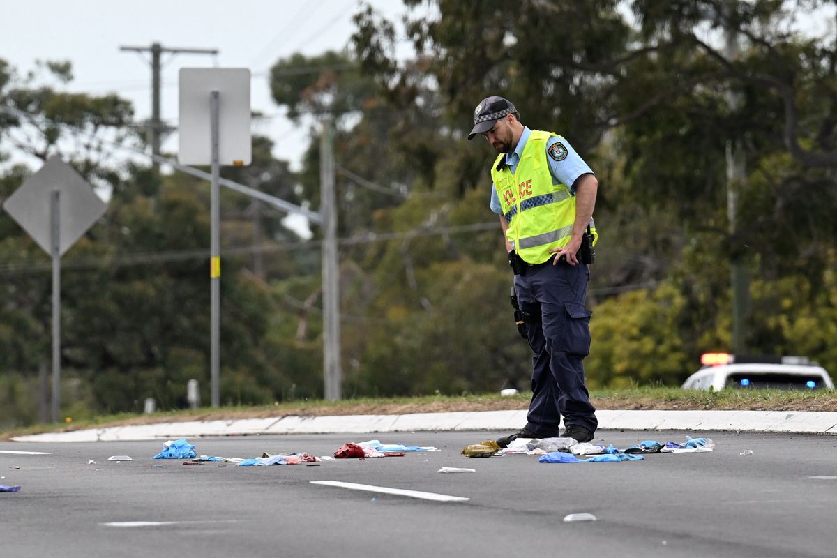 Australia police charge man with being alleged mastermind of global crime app