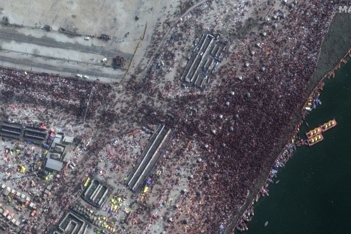 Millions of Hindus take 'holy dip' a day after fatal stampede
