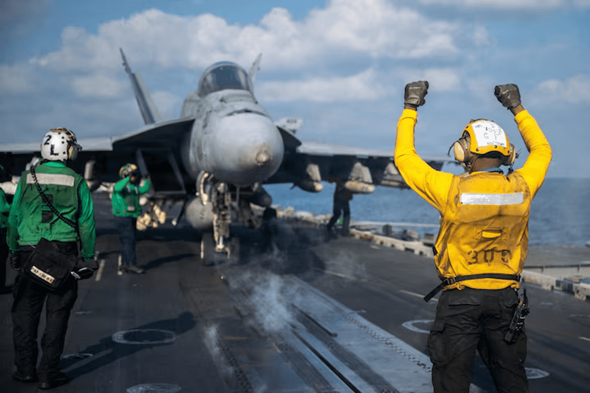 US says it struck Iranian military sites, Tehran responds with air base attack