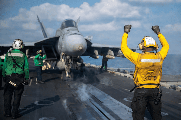 US says it struck Iranian military sites, Tehran responds with air base attack