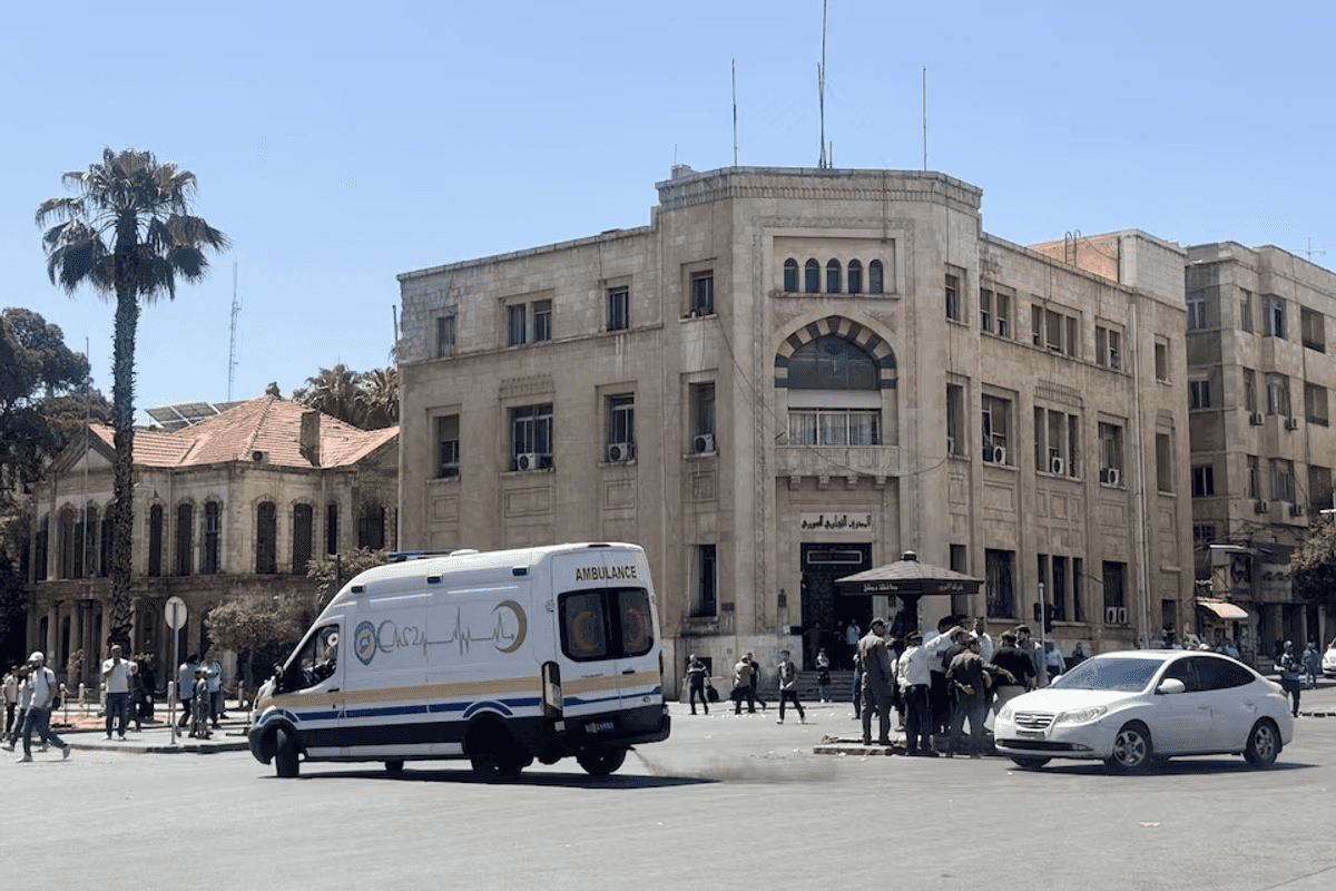 Damascus blasts wound 18 as Macron visits Syria