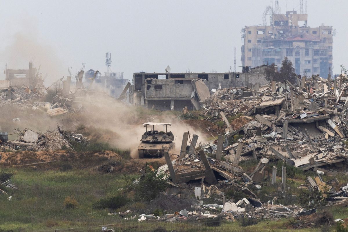 Israeli forces have completed encirclement of Gaza's Rafah, military says