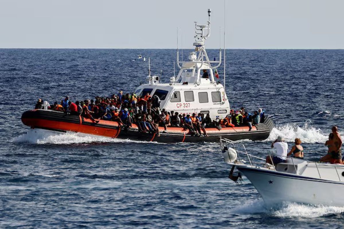 Italy delivers first migrants to Albania under new deal