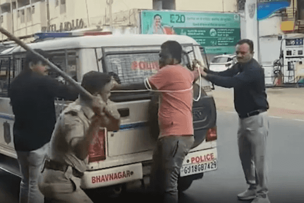 Indian police publicly beat man accused of killing partner
