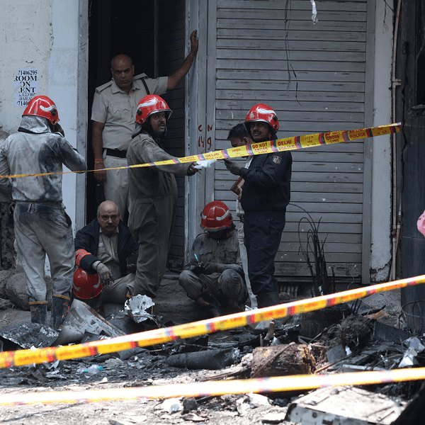 Delhi hotel fire: owner arrested after blaze kills 21, including foreigners
