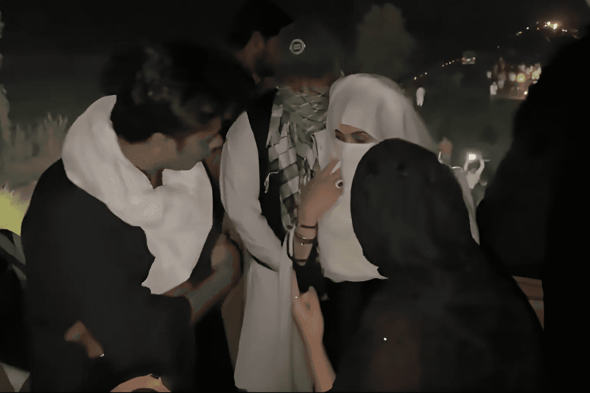 Bushra Bibi, wife of jailed PTI leader Imran Khan, climbed atop a container near Ghazi Barotha Bridge to assess the situation.