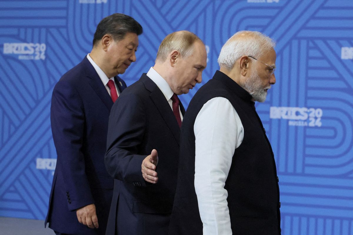 Putin scores a BRICS win in rare show of harmony with Xi and Modi