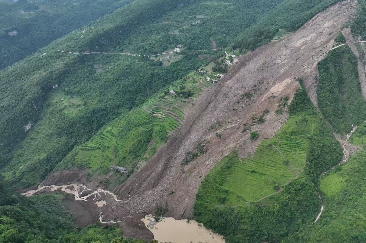 At least four killed and 17 trapped in China landslides