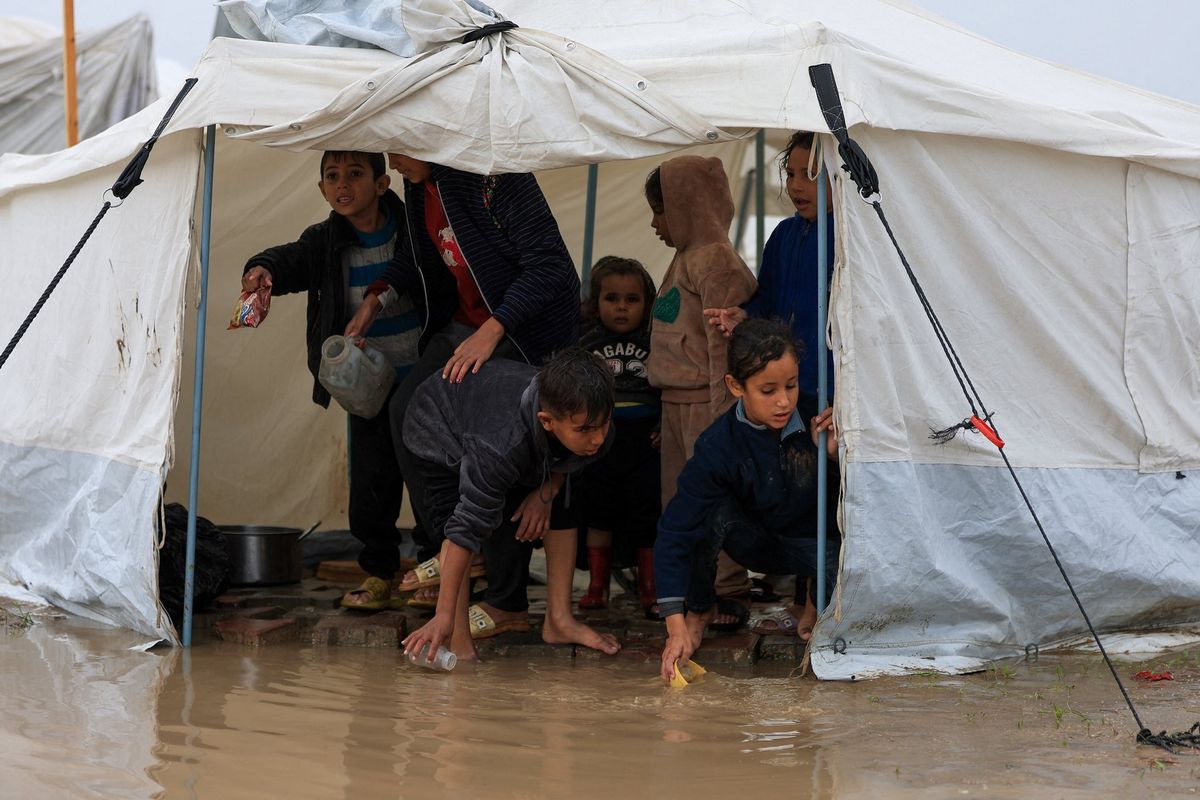 Torrential rain flooded Gaza tents and a baby died of exposure, medics say