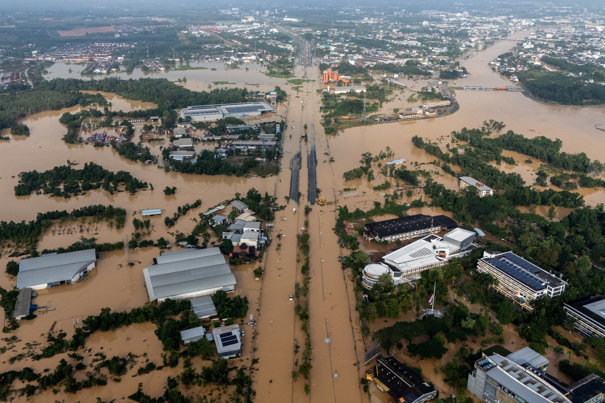Race to get aid to Asia flood survivors as death toll tops 1,300