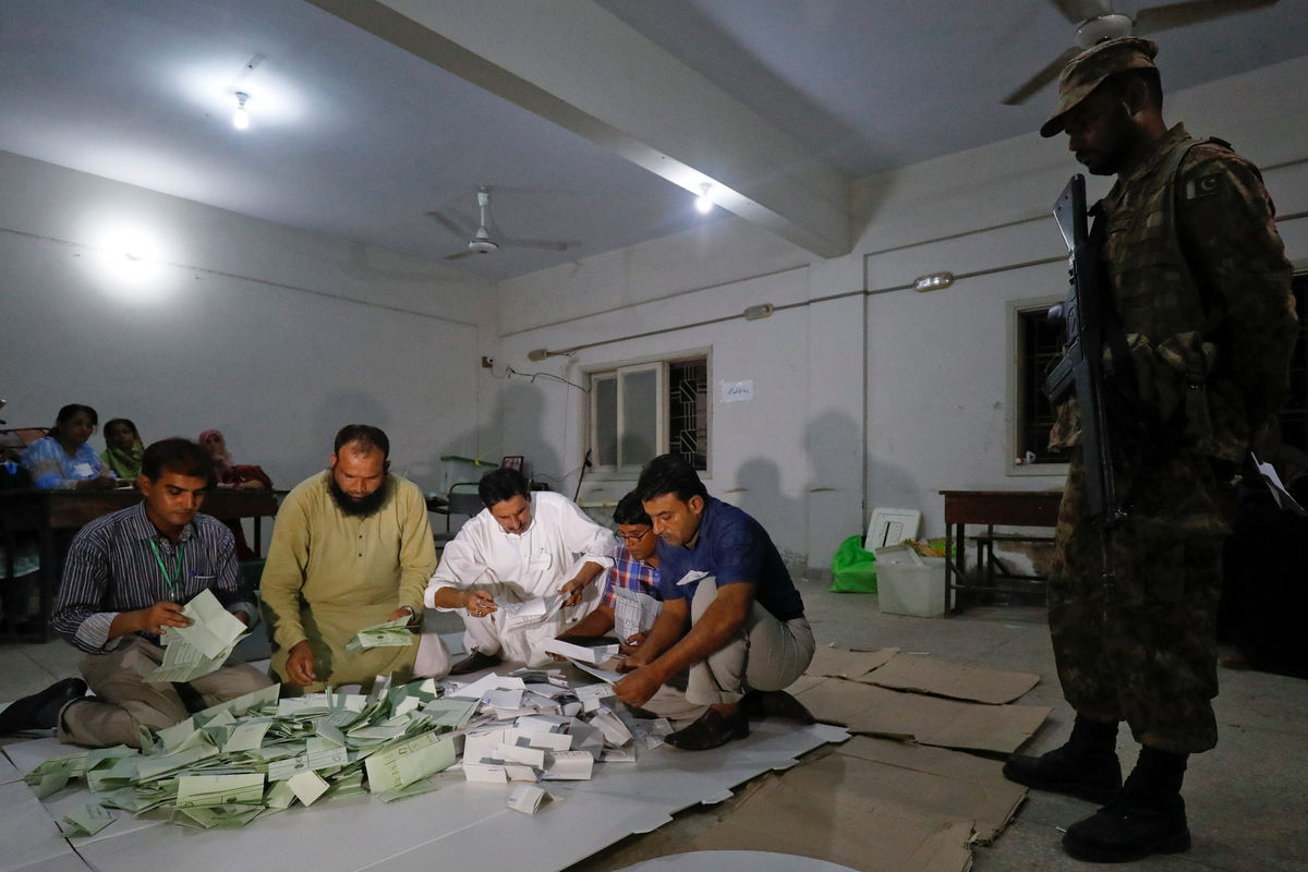 Pakistan begins vote count after by-elections in 13 constituencies