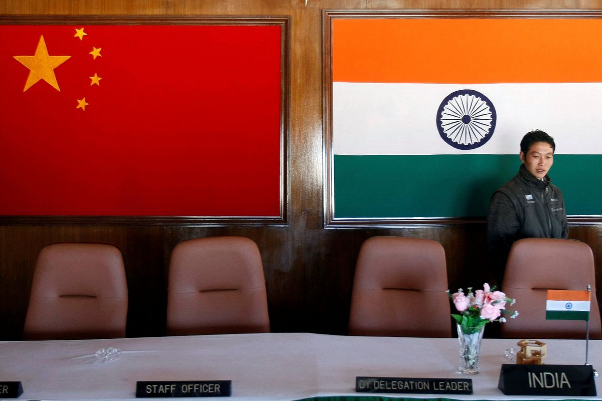 China confirms pact to resolve border conflict with India