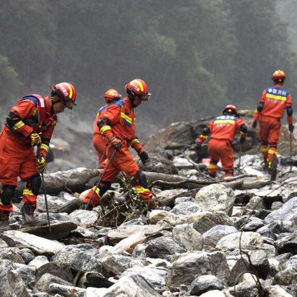 Rescuers dig into tunnel as missing toll from Nepal, China flood tops 3,000