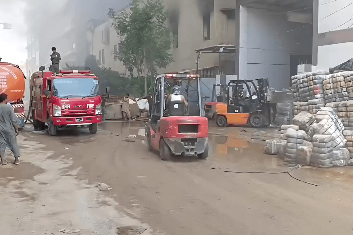 Building collapses as factory fire burns for 14 hours in southern Pakistan