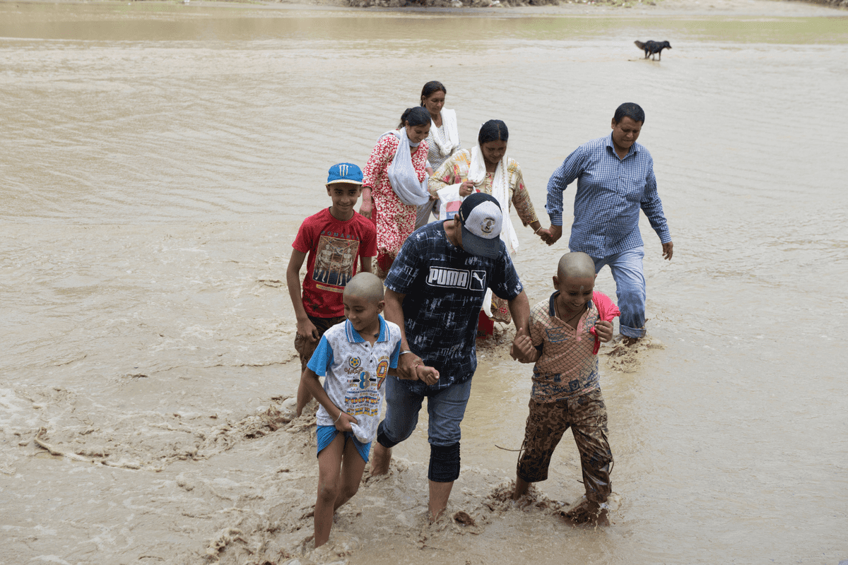 Potentially deadly flood smashes village in Indian-administered Kashmir