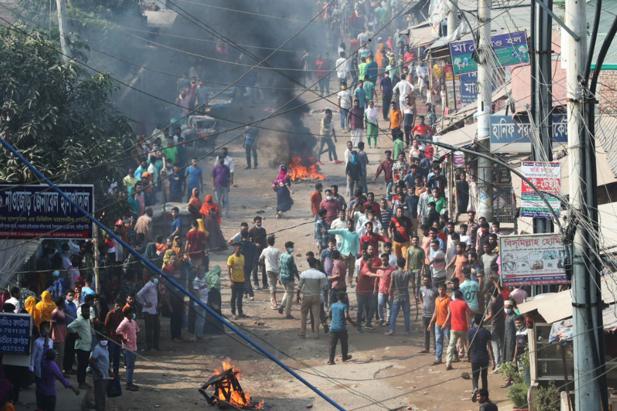 Bangladesh garment workers clash with police, two teenagers wounded