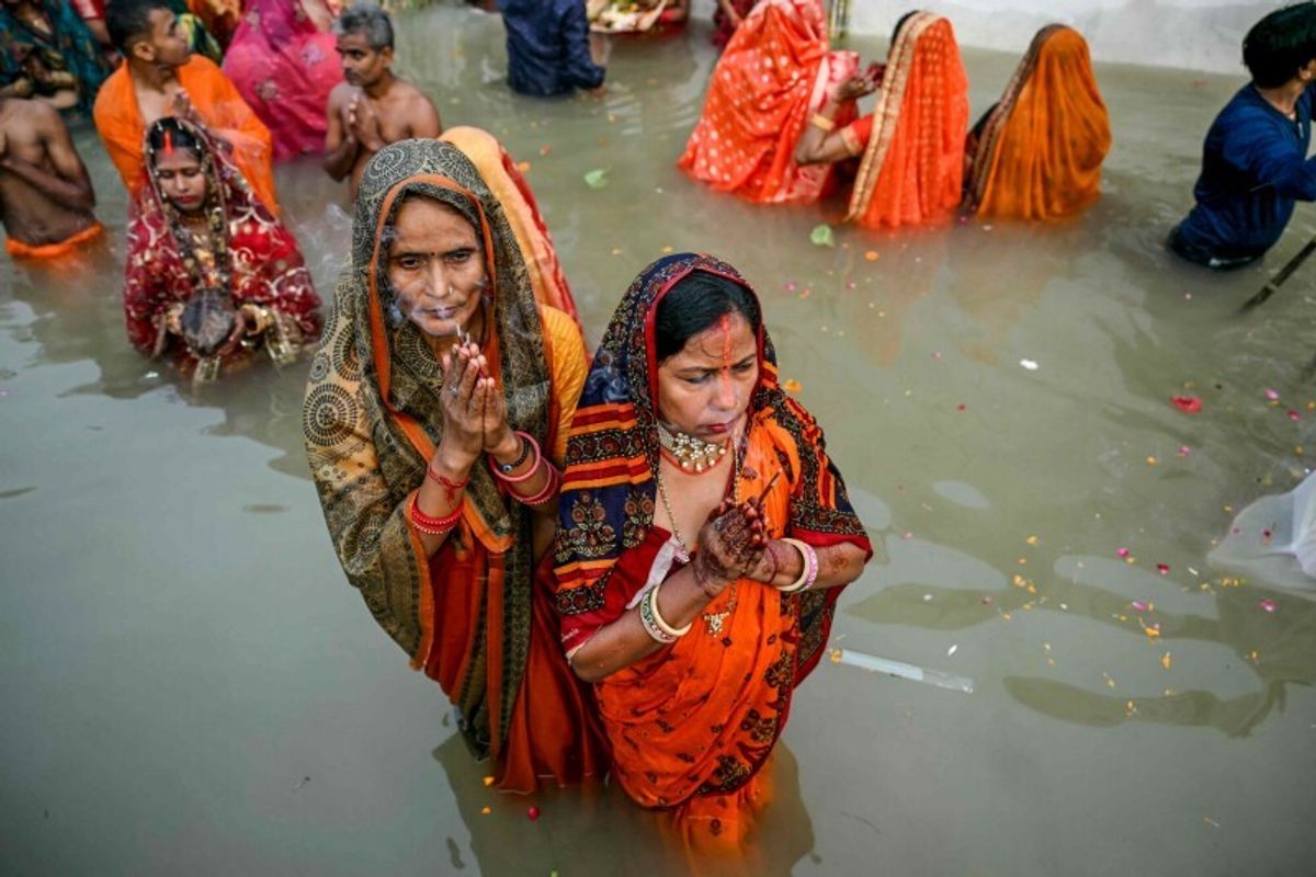 India's Hindus bathe in holy river defiled by pollution