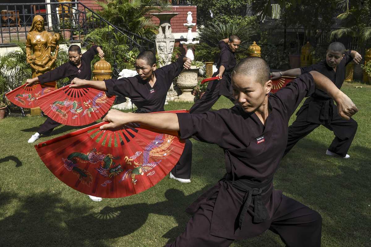 Nepal's 'kung fu nuns' mark monastery reopening with martial arts display
