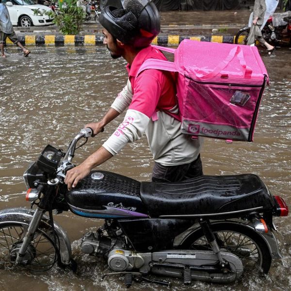 No pause for food delivery riders during Pakistan's monsoon