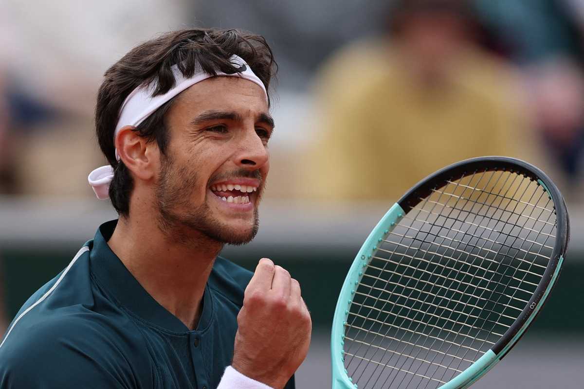 Big names crash but Italians shine on damp day at French Open