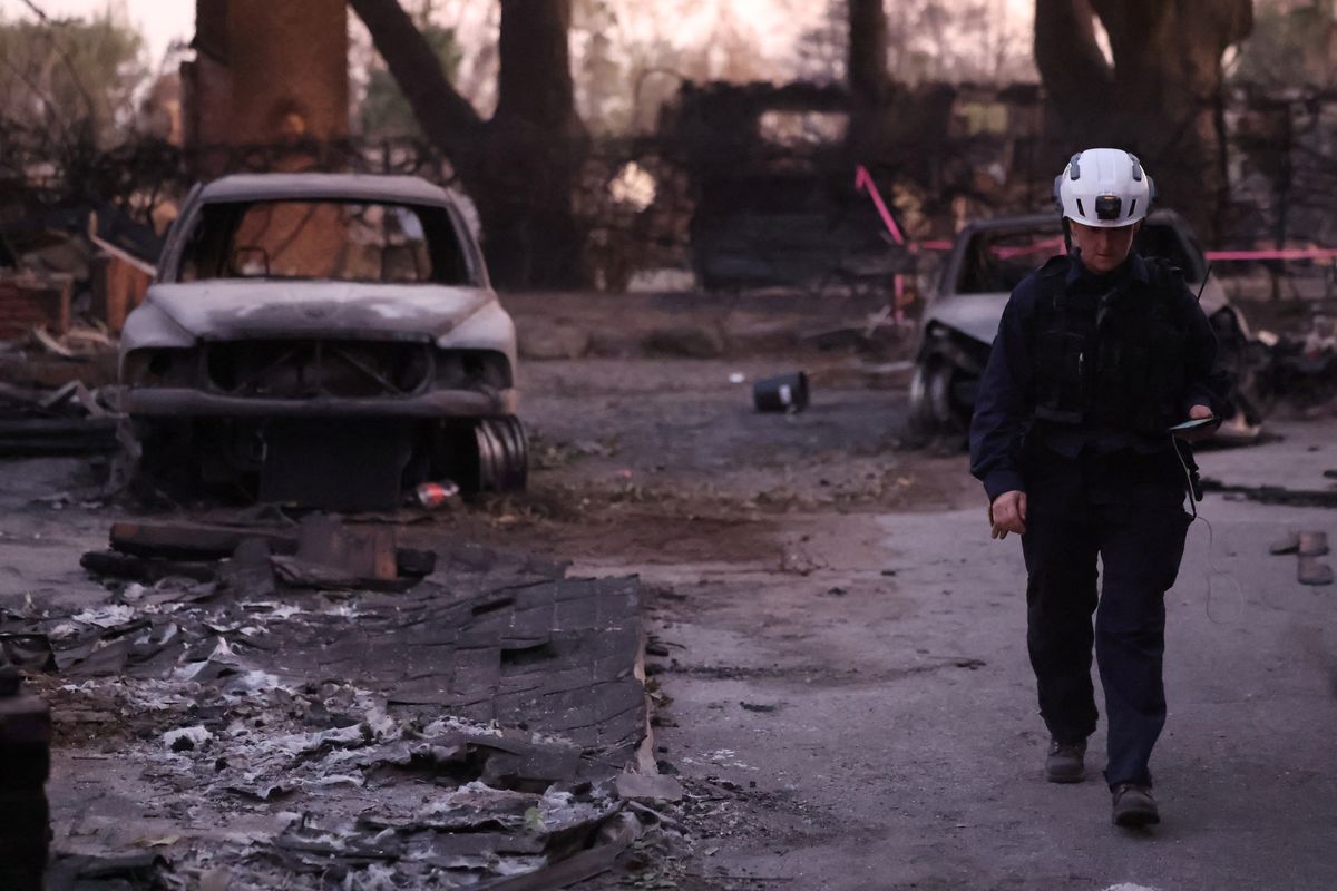Firefighters race to beat LA blazes as winds grow and death toll hits 16