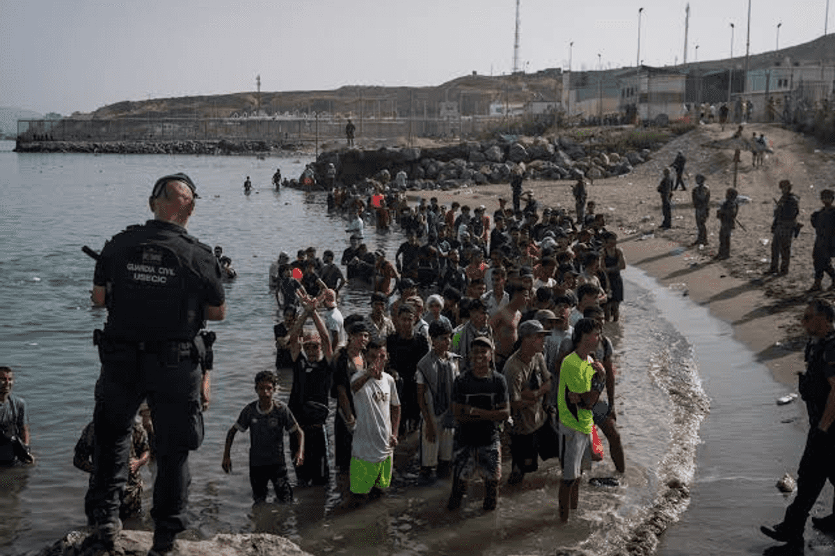 Spain's Ceuta overwhelmed as thousands remain after migrant border rush