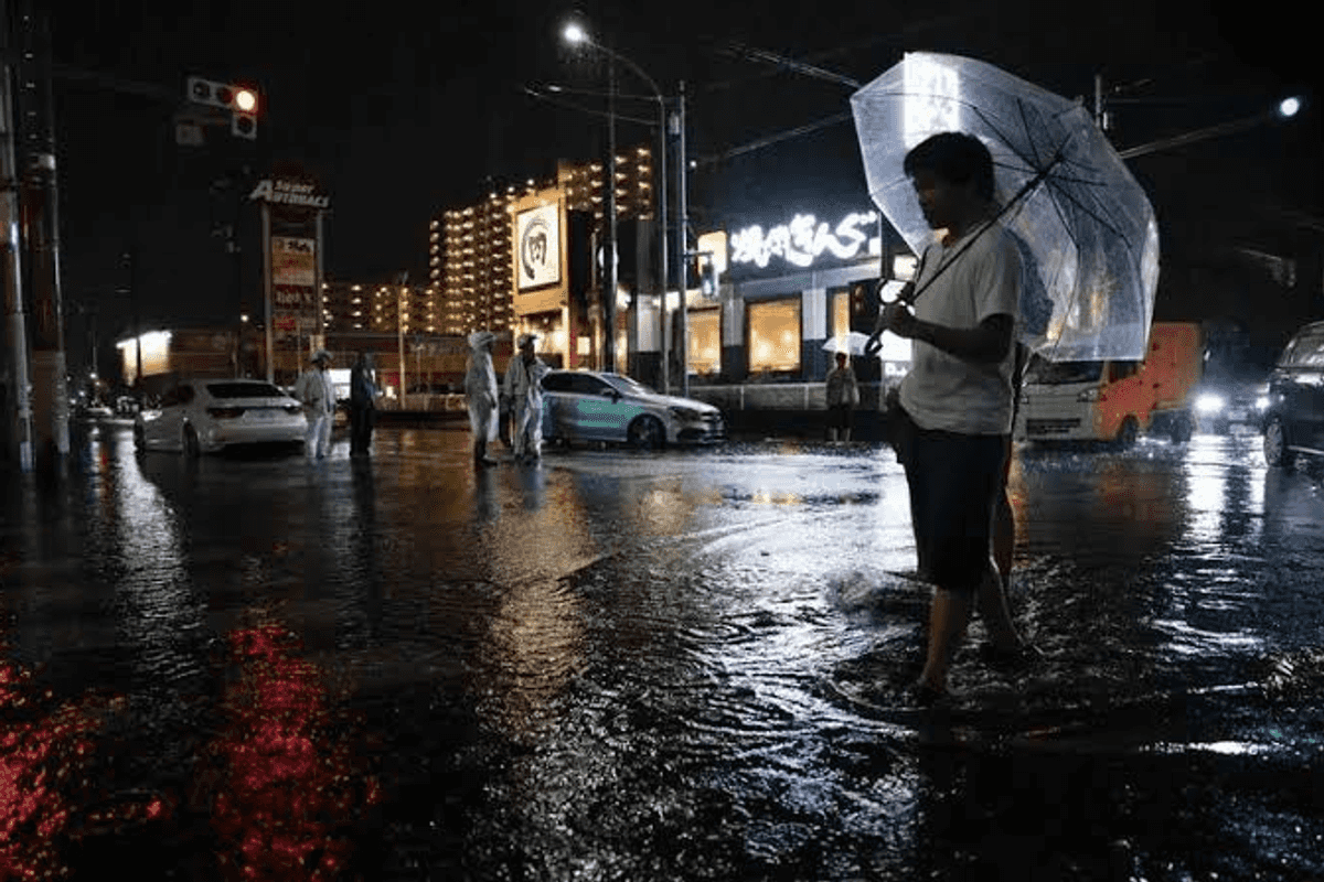 Japan's record rains strand thousands at Narita airport; kill eight