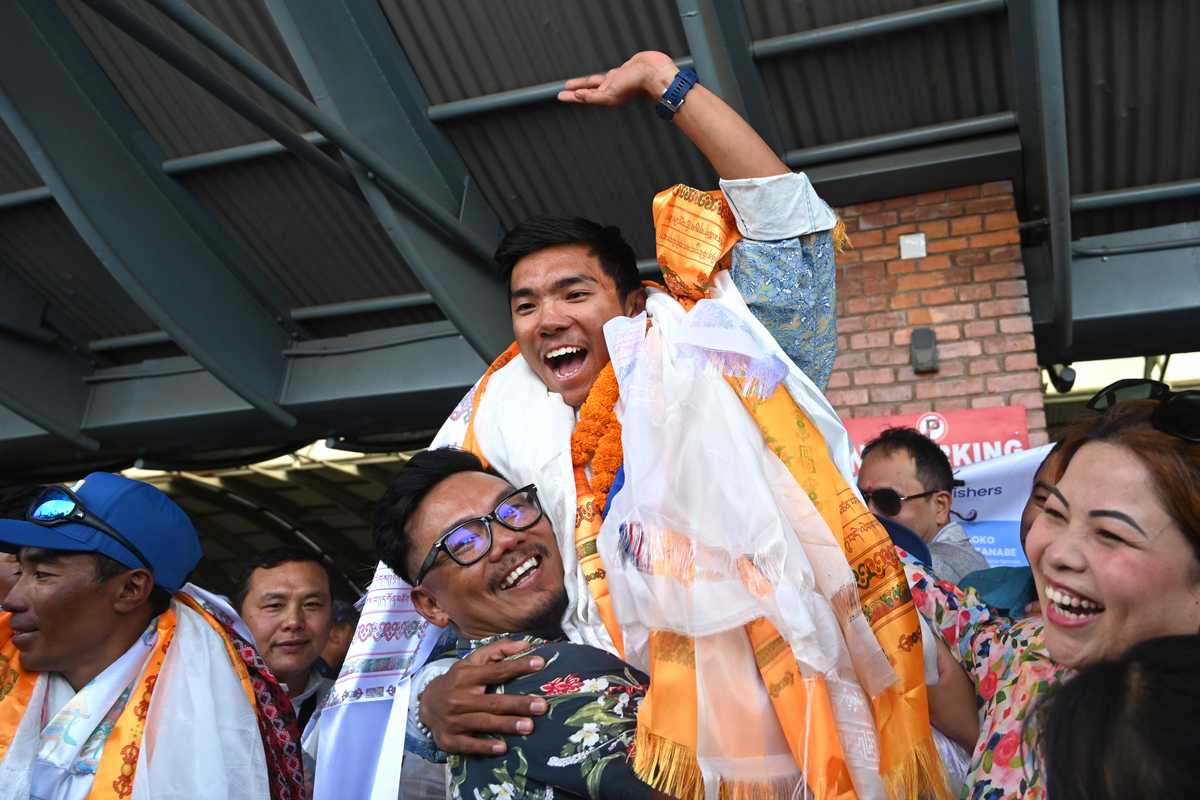 Nepali teenager hailed as hero after climbing world's 8,000m peaks