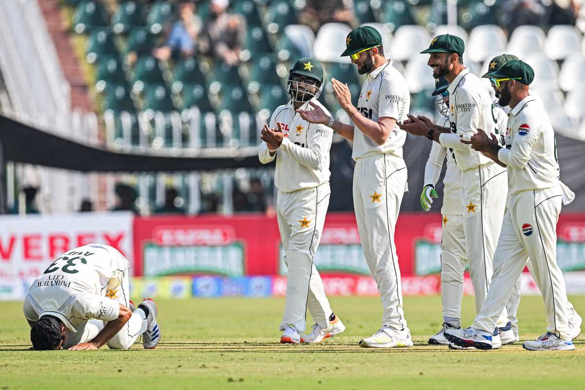 Former minister Waris Afridi beams as son Asif takes five on Test debut