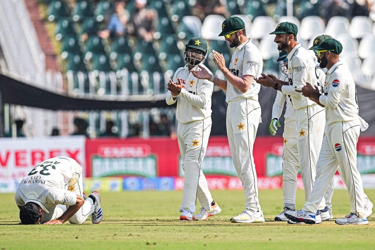 Former minister Waris Afridi beams as son Asif takes five on Test debut