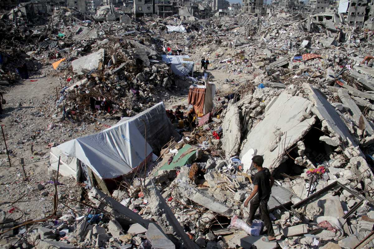 Two Israeli hostages released, one expected later in latest Gaza exchange