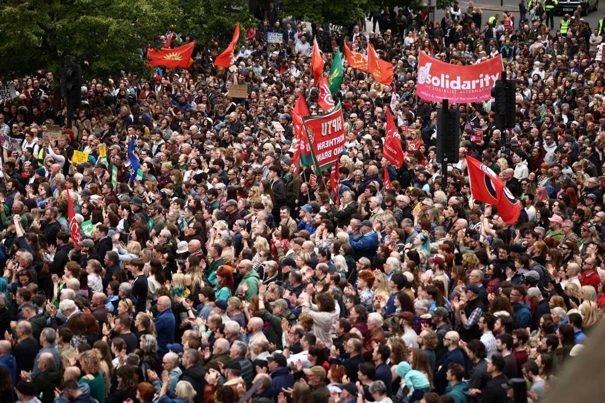 Thousands gather for anti-racism rally in Belfast after two nights of disorder following stabbing