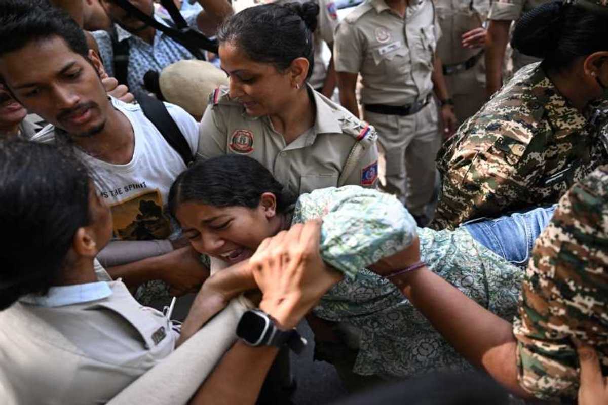 Indians protest election chief as police probe harassment claims