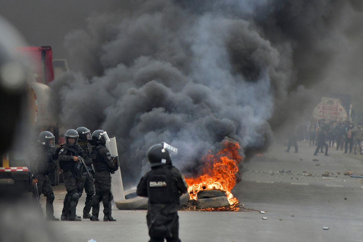 Ex-president of Bolivia says 14 shots fired at his car