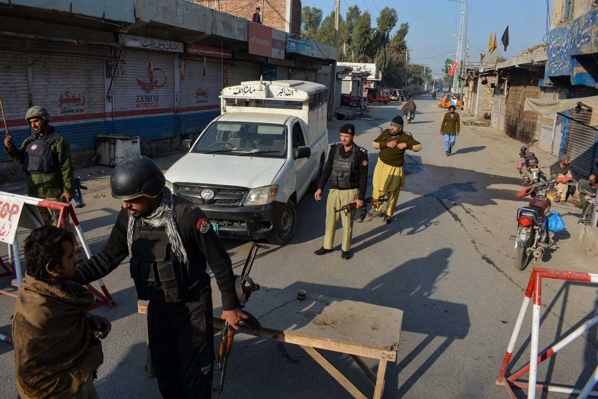 Four cops, five militants killed in attack at police HQ in Pakistan's KP