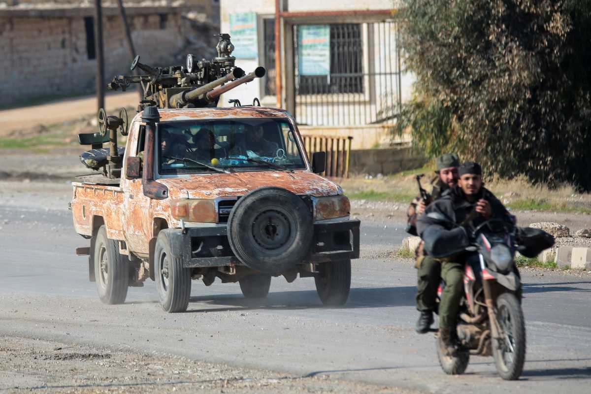 As Syrian rebels sweep into Aleppo, army closes airport and roads, sources say
