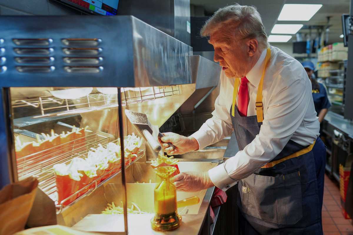 Swinging campaigns: Trump serves fries, Harris goes to church