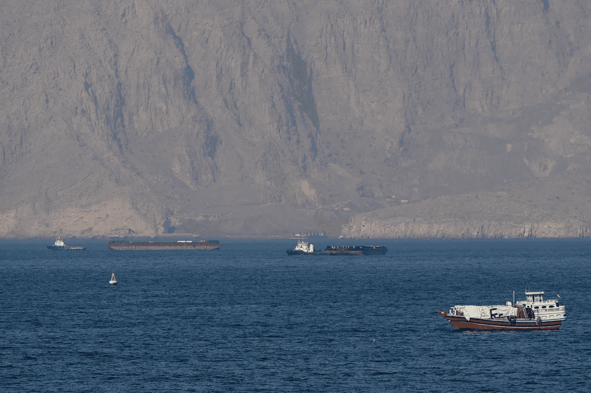 Iran warns of ceasefire violation as US plans to escort Hormuz ships