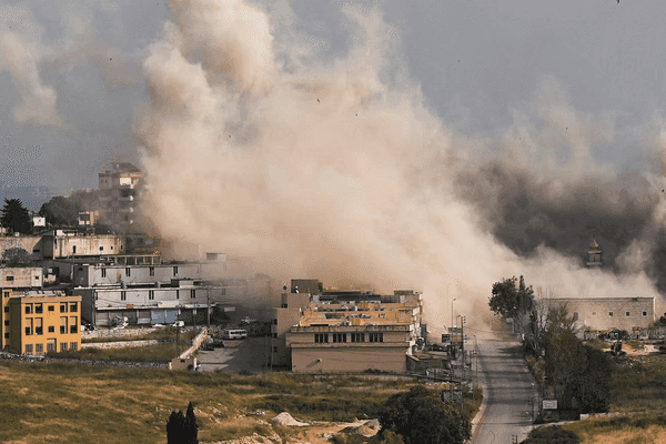 Israel says US backs striking Beirut suburbs if Hezbollah attacks