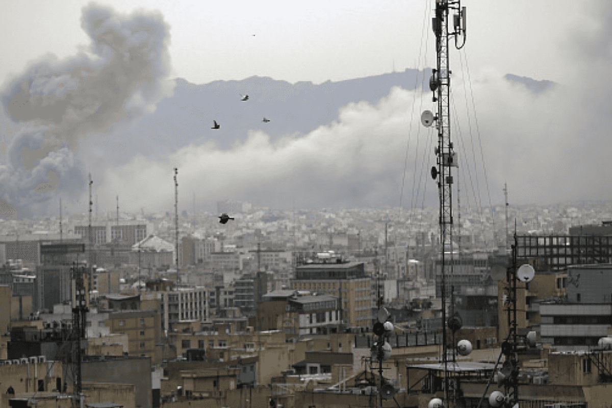 Iran vows 'crushing' attacks as strikes hit regional infrastructure