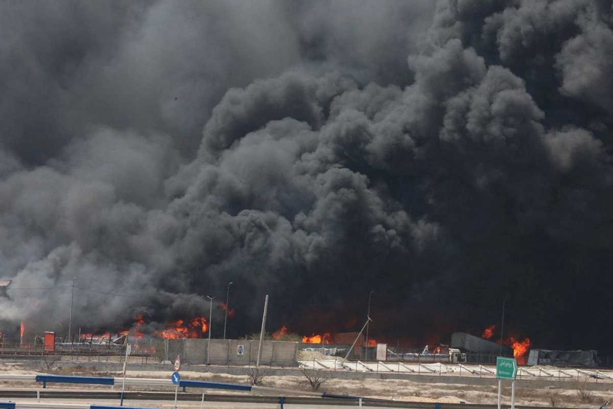 Iran minister blames 'negligence' for port blast that killed 65
