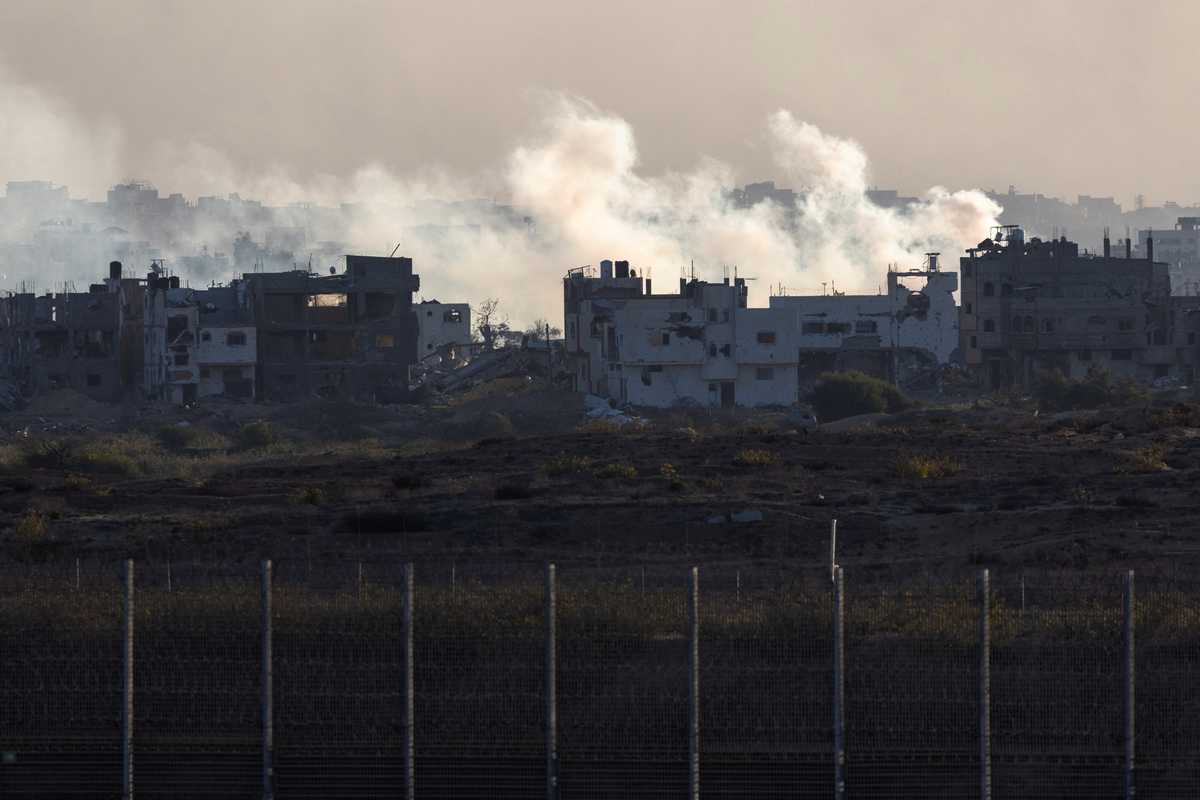 Israeli airstrikes kill extended families in two Gaza homes