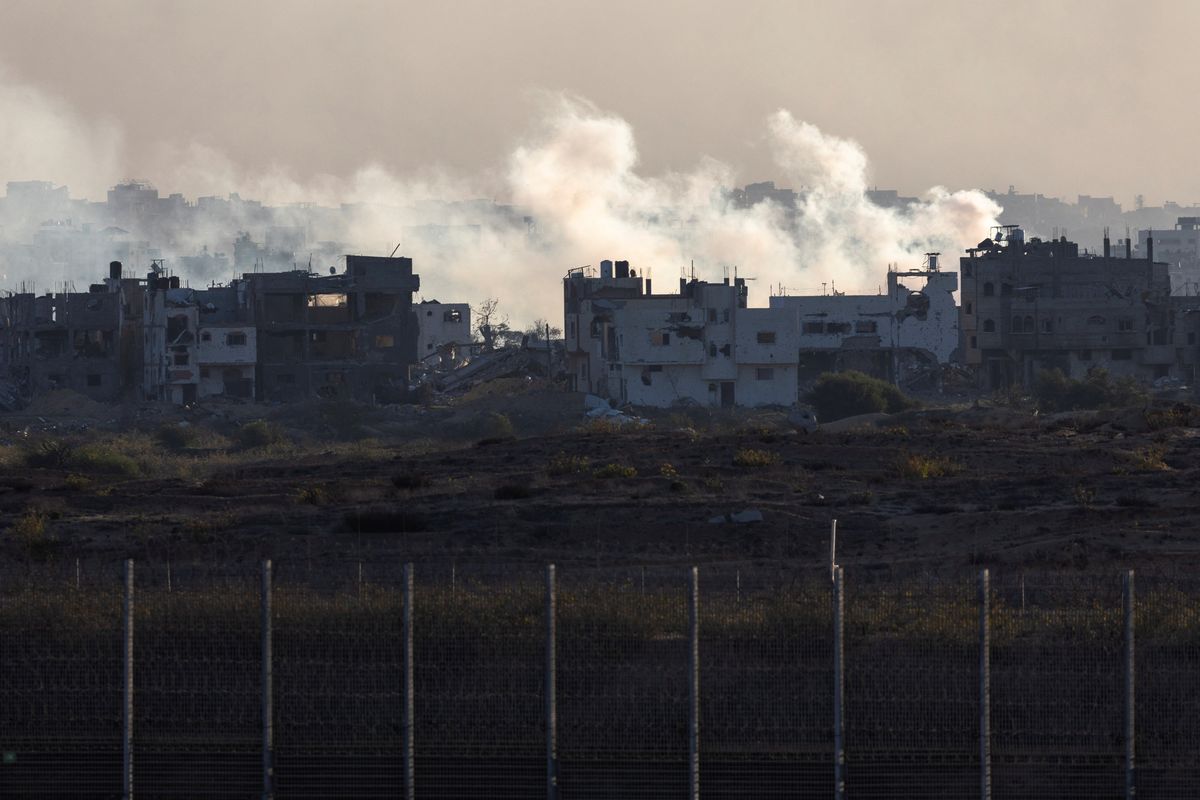 Israeli airstrikes kill extended families in two Gaza homes