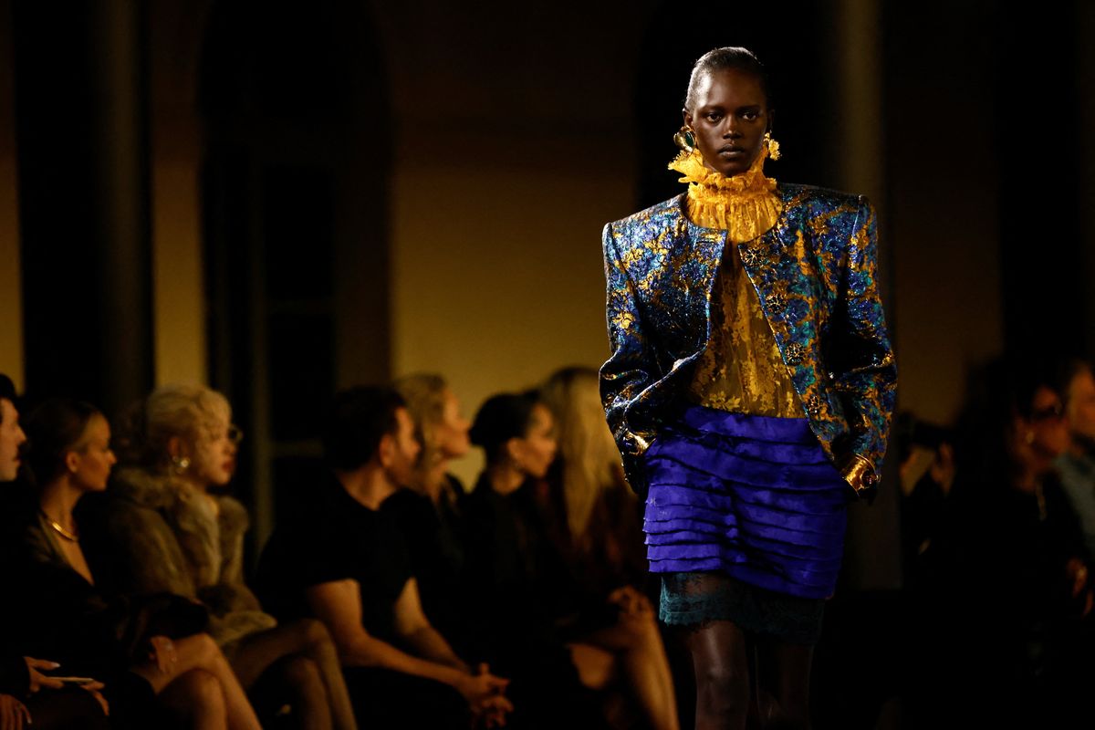 Saint Laurent hits masculine note for spring catwalk show